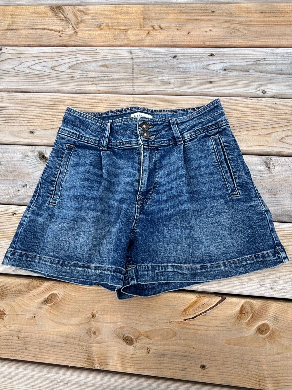 High waist, wide leg jean shorts with pleats and stretch